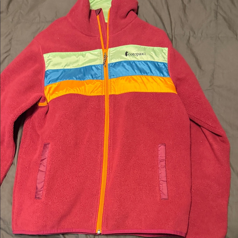 cotopaxi Red Kids Fleece Jacket with Blue, Yellow, and Light Green Stripes